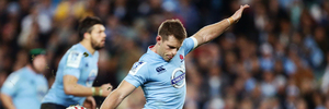 Bernard Foley of the Waratahs kicks a conversion during the Super Rugby Semi Final match against the Brumbies. Photo / Getty Images