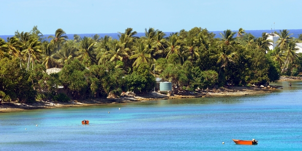 Climate change is blamed for rising seas that are swamping parts of Tuvalu and contaminating the island's water supply.