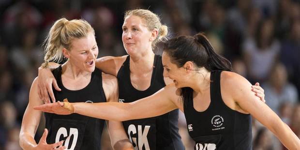 From left to right, New Zealand's Katrina Grant, Casey Kopua and Joline Henry celebrate New Zealand's win over Engand in Glasgow. Photo / Greg Bowker