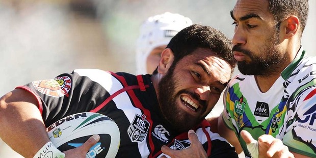 Konrad Hurrell of the Warriors is tackled during the round 21 NRL match between the Canberra Raiders and the New Zealand Warriors at GIO Stadium. Photo / Getty Images.