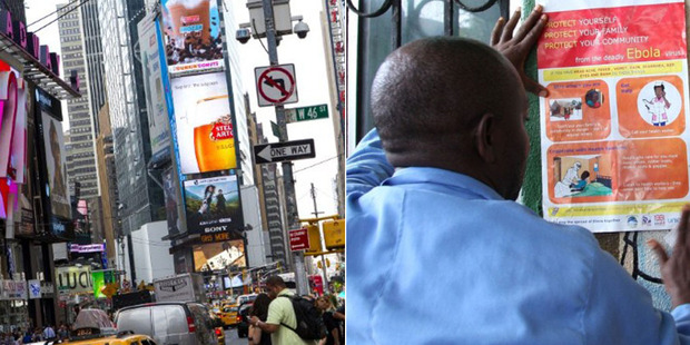 A man has been admitted to a hospital in New York City with Ebola-like symptoms. Right, a health worker puts up a poster about Ebola in Monrovia. Photo / AFP