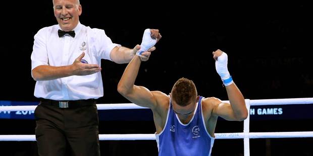 New Zealand boxer David Nyika reacts after winning the men's 81kg final. Photo / Getty Images
