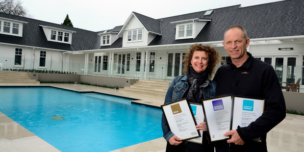 House of the year winners Helen and Paul Riordan at the $2 million mansion, built by Riordan Construction Ltd. Photo / George Novak