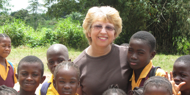 Oct. 7, 2013 photo provided by Jeremy Writebol show his mother, Nancy Writebol, with children in Liberia. Photo / AP