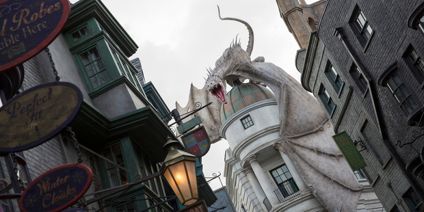 A dragon sits atop Gringotts Bank in Diagon Alley in The Wizarding World of Harry Potter, Orlando. Photo / AP