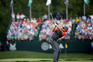 Rory McIlroy, of Northern Ireland, hits his tee shot on the eighth hole during the first round of the PGA Championship golf tournament at Valhalla Golf Club. Photo / AP