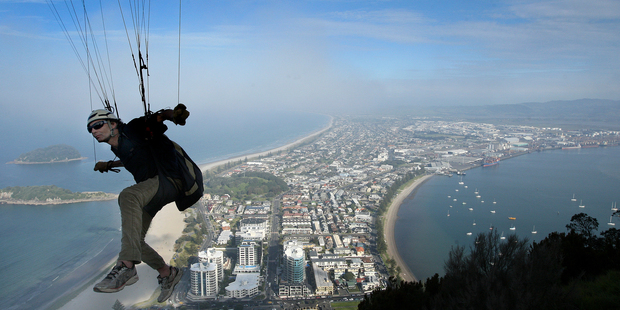 Paragliding is what might termed a 'real adventure' in New Zealand tourism. Photo / Alan Gibson