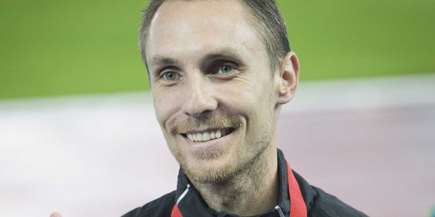 New Zealand's Nick Willis after claiming the bronze medal in the men's 1500m final. Photo / Greg Bowker