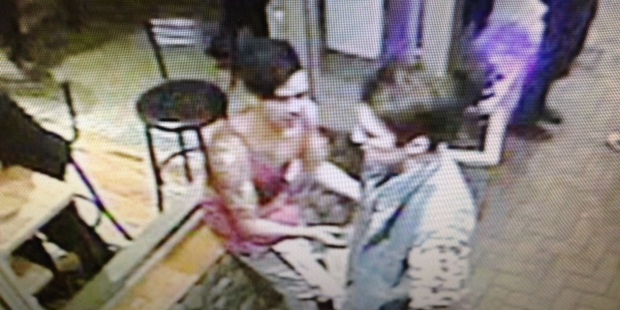 Police are also seeking to identify the two males pictured in the attached photos (wearing the denim vest and the pink singlet).