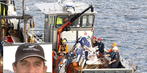The wreckage of a missing biplane of Daroish Kraidy (inset) is picked up in fishing nets by the the fishing vessel San Kawhia off the southern point of Great Barrier Island. Photo / Chris Gorman