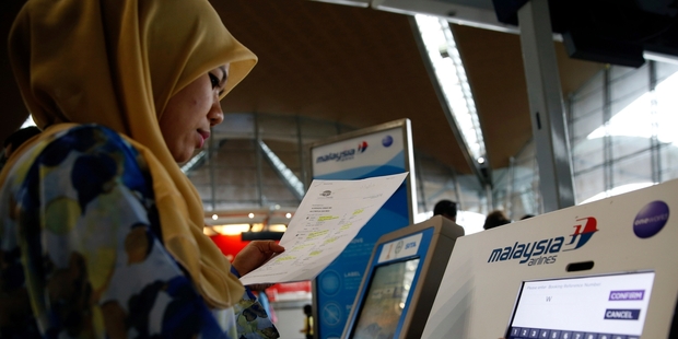 Troubled carrier Malaysia Airlines will undergo its fifth major restructuring in 12 years . Photo / AP
