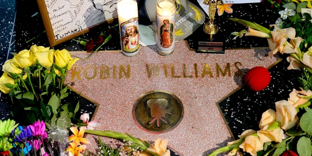 Fans have placed tributes to Robin Williams on his Walk of Fame star. Photo / AP