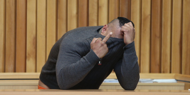 Donny Falakoa, 32, appeared in Tauranga District Court yesterday where he covered his face and gave a rude gesture while being photographed.