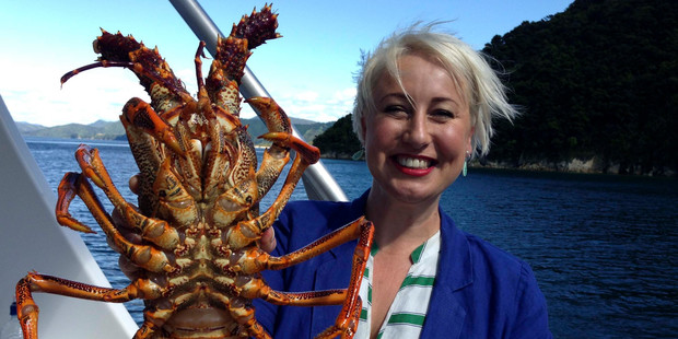 Television host Yvonne Lorkin with a good-sized crayfish.