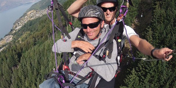Jeremy Williams paragliding Queenstown with infinity paragliding with makingtrax leg harnesses.
