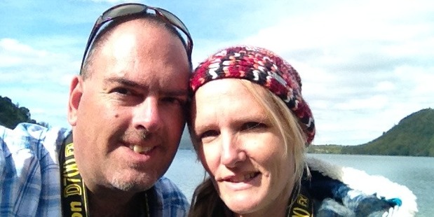 Volunteer ambulance officer Cathy Franzoi, pictured here with her husband Rodney, was shot in the leg in PNG.