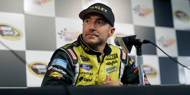Marcos Ambrose had to settle for second in the NASCAR Sprint Cup Series auto race at Watkins Glen International after a tough fight for first place. Photo / AP