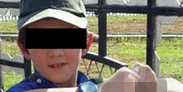 The photo Khaled Sharrouf posted to Twitter of his son in Syria. Photo / Twitter; The Australian