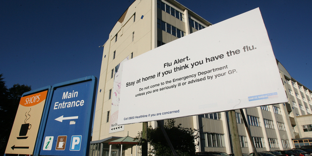 Signs like this one went up at Middlemore Hospital in Auckland when swine flu was in full force. Photo / File