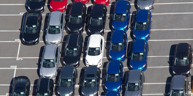 Imported cars, new and used sit on the wharf at the Ports of Auckland. Photo / Brett Phibbs