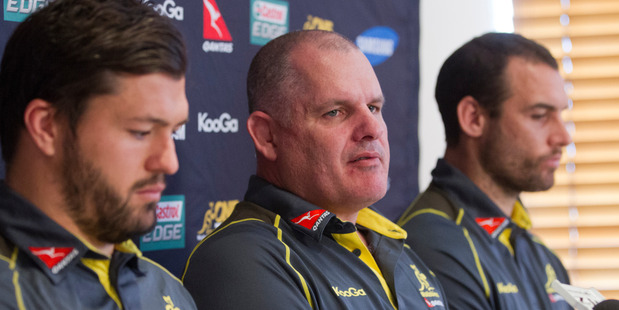 Wallabies coach Ewen McKenzie, flanked by captain Adam Ashley-cooper, left, and lock Scott Fardy. Photo / Mark Mitchell