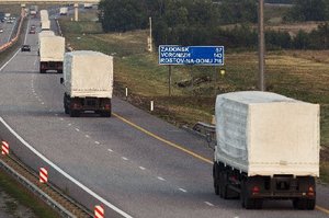 A convoy of white trucks leaves Russia bound for Ukraine. Photo / AP