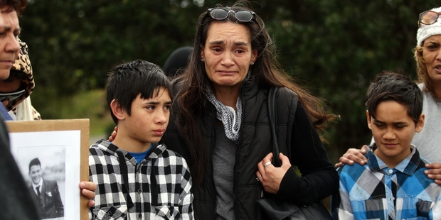 Stephen Dudley's mother, Mona, with his brothers Aaron and Leith at yesterday's march. Photo / Doug Sherring