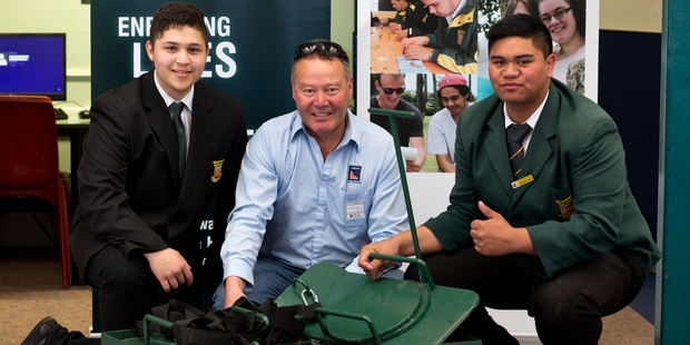 Leighton mentor Sonny Takerei, centre, has been helping students including Joshua Peterson, left, and Robert Rudolph to build quad-burners. Photo / Dean Purcell