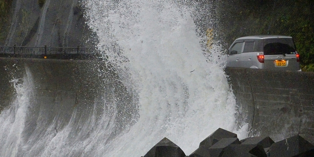 Waves whipped up by the typhoon in Kushimoto. Photo / AP