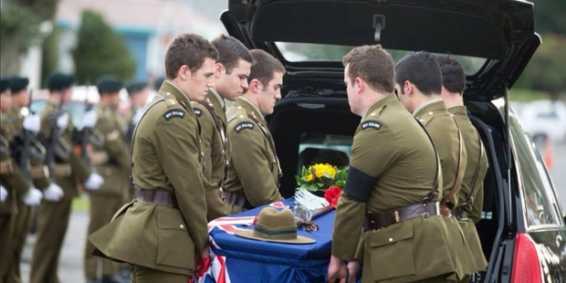 Colleagues carry Lieutenant Sam Scott's casket at Linton Military Camp yesterday.
