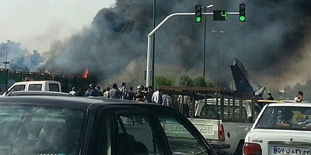 A plane crash in Iran is thought to have killed 40 people. Photo / Twitter
