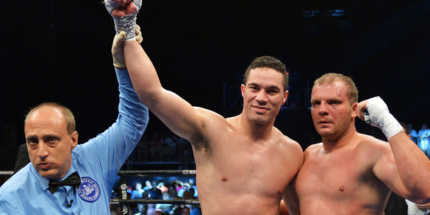 Joseph Parker of New Zealand celebrates his third round win over Keith Thompson. Photo / Getty Images