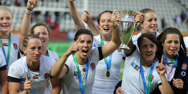 Captain of England Katy McLean holds the trophy with teammates to celebrate their victory in the IRB Women's Rugby World Cup 2014 Final. Photo / Getty Images
