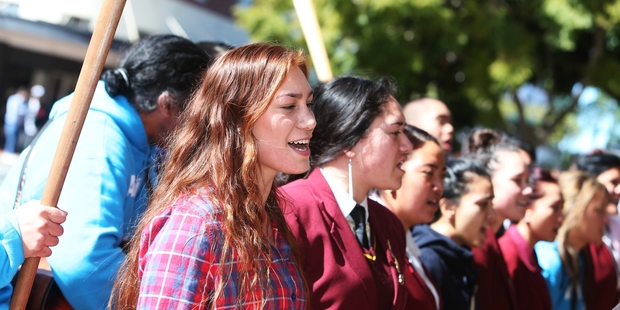 Protesters came from as far away as Auckland to support Monet-Mei Clarke (front). Photo / Michael Cunningham