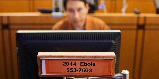 A sign designates a workstation dedicated to Ebola in the Emergency Operations Center at the US Center for Disease Control and Prevention. Photo / AP
