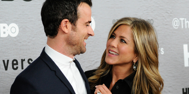 Jennifer Aniston says she goes out less to avoid cyber bullying. Photo/AP