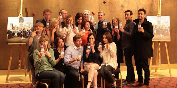The cast of Downton Abbey respond to their water bottle photo mishap. Photo/Twitter