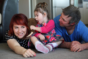 Ariana Lawn with her parents Cerise and Tim at their rural Opunake home. Photo / Glenn Jeffey