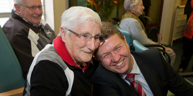 Labour leader David Cunliffe is grabbed by Vilma Brooking during his visit to Wesleyhaven Retirement Village in Lower Hutt. Photo / Mark Mitchell