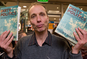 Author Nicky Hager with copies of his book, Dirty Politics.
