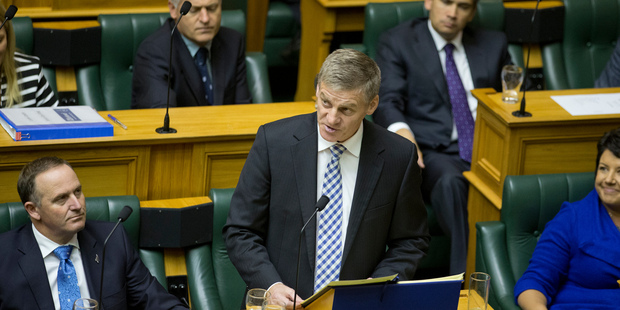 Finance Minister Bill English reading his 2014 Budget in Parliament. Photo / Mark Mitchell