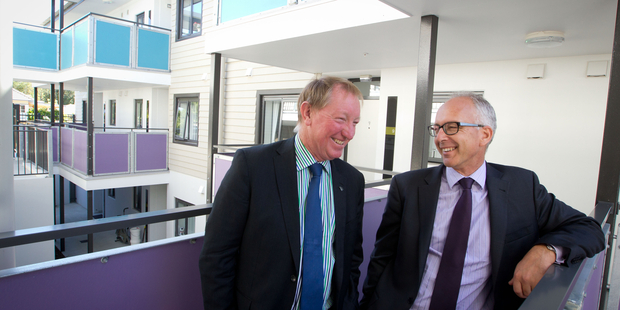 Housing Minister Nick Smith, left, and Housing NZ chief executive Glen Sowry look around a housing redevelopment in Three Kings in March. Photo / Richard Robinson