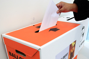 Online tools like Vote Compass can help you decide which party to vote for. Photo / Martin Sykes