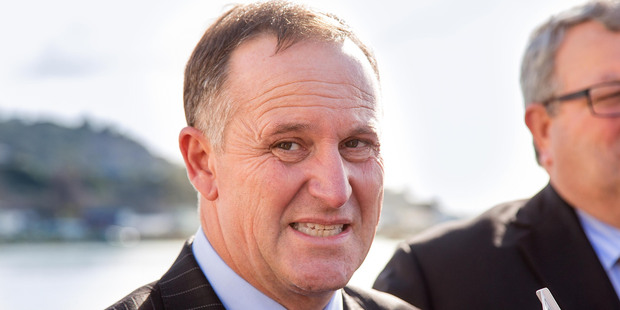 Prime Minister John Key speaks to the media at Christchurch Yacht Club, Moncks Bay. Photo / Martin Hunter