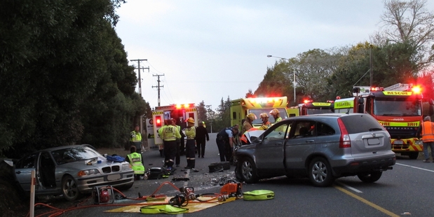 Emergency services at the scene of Friday afternoon's crash on State Highway 10. Photo/ Peter de Graf