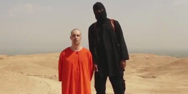 A video still released by ISIS that purports to show the killing of journalist James Foley. Photo / AP