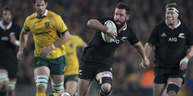 Ryan Crotty makes a break against the Wallabies at Eden Park. Photo / Brett Phibbs