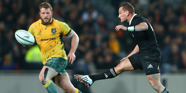 Aaron Cruden kicks the ball against the Wallabies at Eden Park. Photo / Getty Images