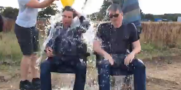 Tom Cruise and Chris McQuarrie get doused in ice. Photo/YouTube