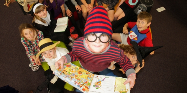 BOOK BUFFS: Finley Duncan (centre), 10, dressed as his favourite character from Where's Wally?, with his equally colourful book character classmates. PHOTO/PAUL TAYLOR HBT1433130103
